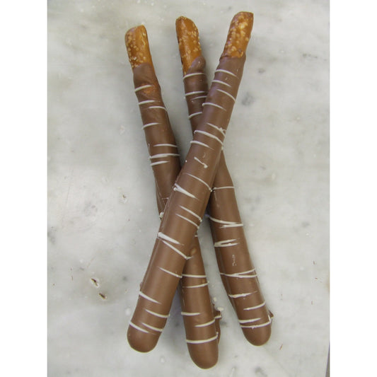 Package of 3, 6 inch pretzel sticks en robed in hand made Belgian chocolate. Cello wrap. Available in dark or milk chocolate.