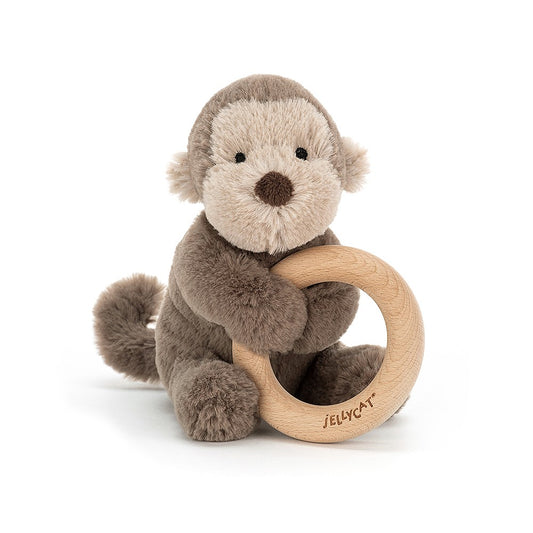 The Shooshu gang is rattling into town!  Our jiggly friends found a fancy wooden ring and want to share it for grabbing and chewing! They are soft little critters with baby soft fur.  Choose from monkey, sloth or bear.  By Jellycat! Tested to  for all ages. Suitable from birth  Sponge clean only; do not tumble dry, dry clean or iron. Check all labels upon arrival of purchase. 6" high x 4" wide, 100% wooden ring is 3" in diameter