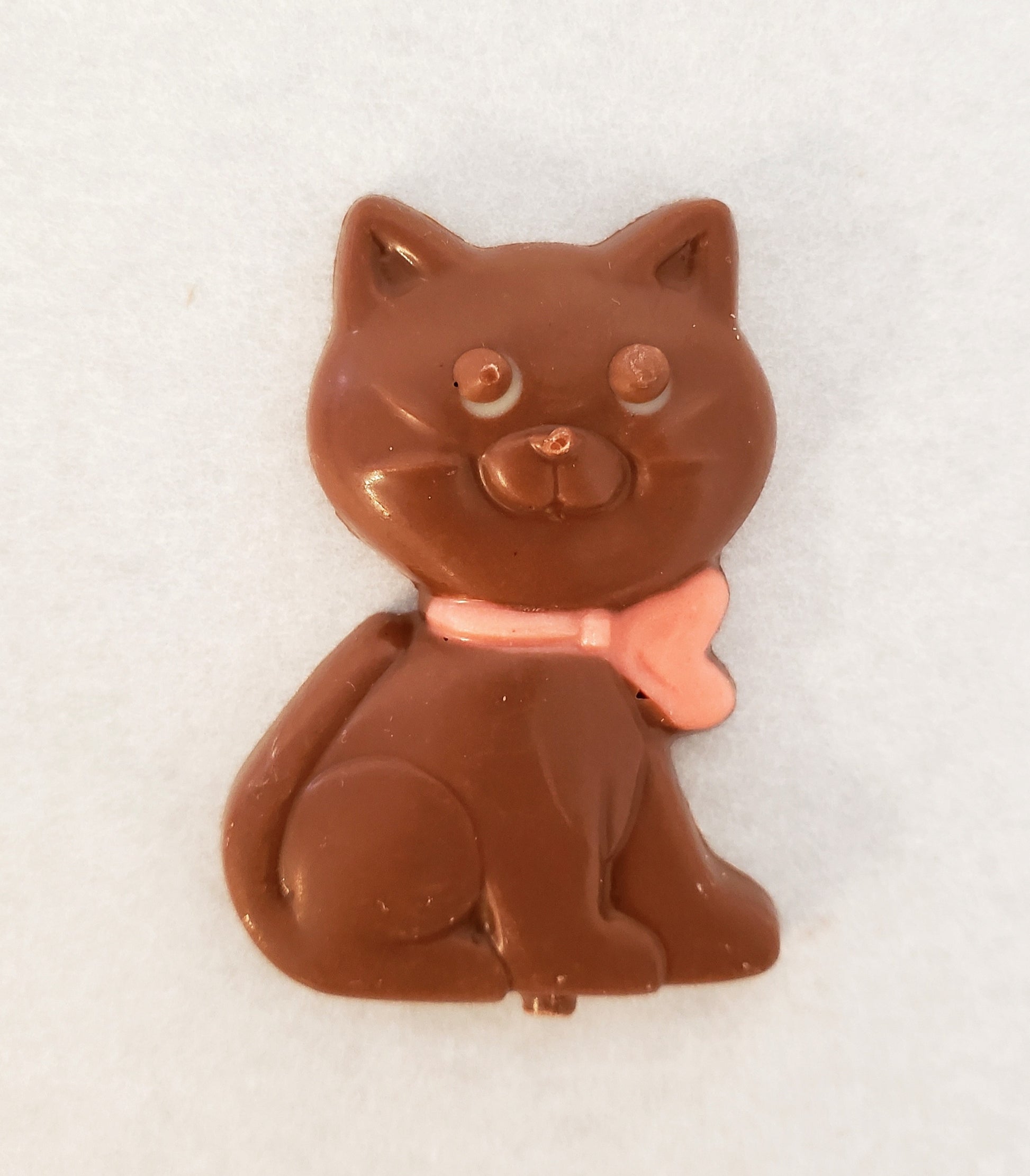 Chelsea Chocolates hand-crafted premium Belgian Callebaut chocolate. Solid chocolate cat (2-1/2” x 1-3/4”) is available in milk chocolate. Peanut & walnut free, tree nut free, wheat free
